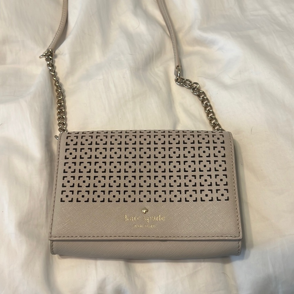 New Kate Spade cross body beige leather bag.